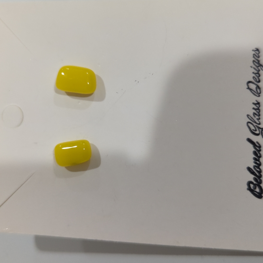 Artisan Handmade yellow rectangle opaque glass studs. 1/2cm in size.